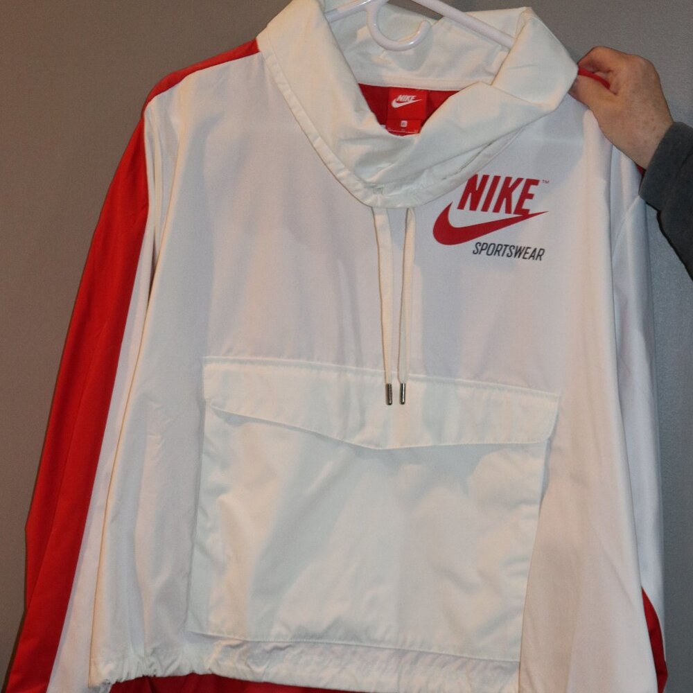 Women's white and red Nike XL pullover windbreaker.